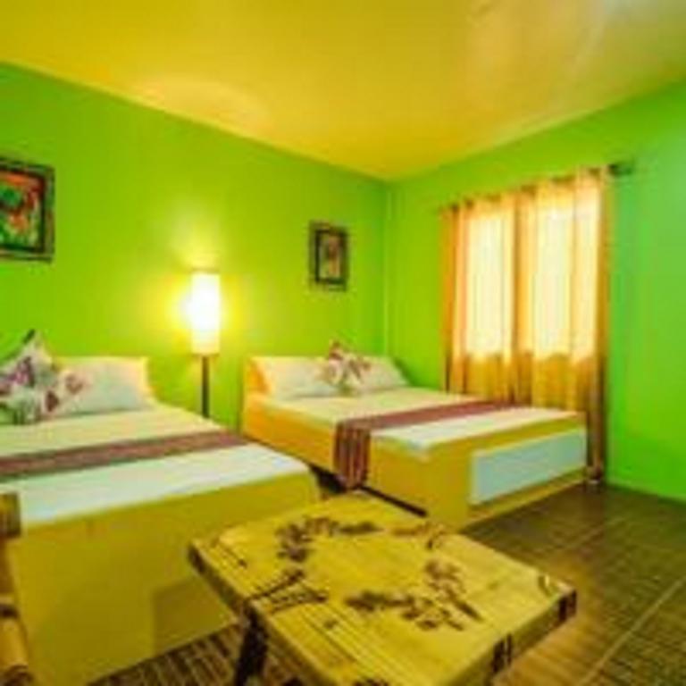 Butterfly Totem Guesthouse Puerto Princesa Chambre photo
