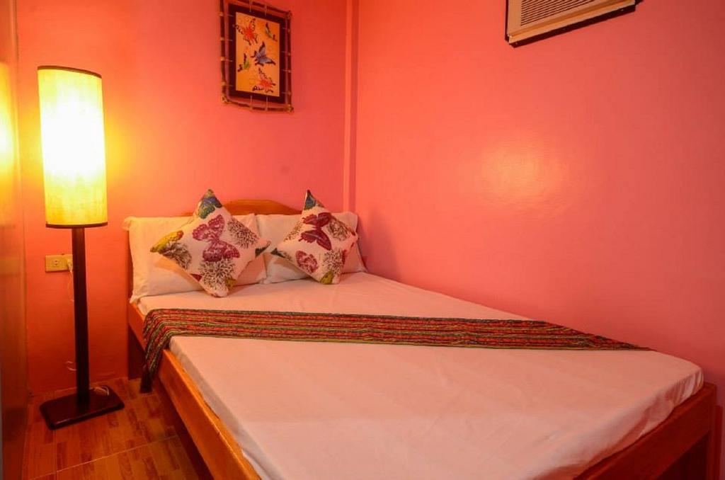 Butterfly Totem Guesthouse Puerto Princesa Chambre photo
